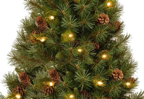 pre lit christmas tree pine cones|More.